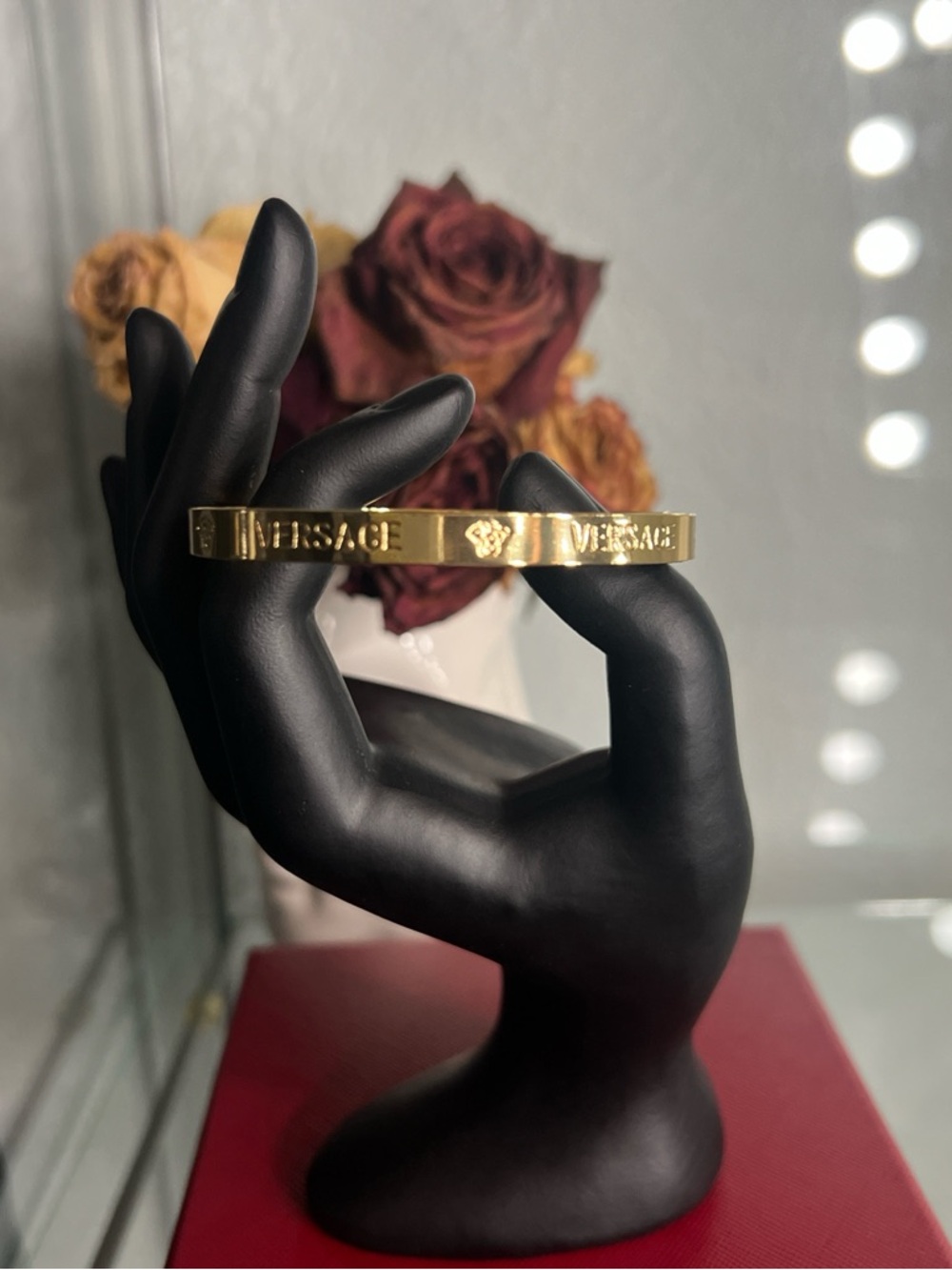 Gold tone bangle